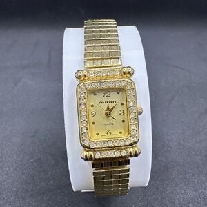 Milan MLN780 Women’s Gold Tone Quartz Watch PC21 Japan Movt Rhinestone Bezel